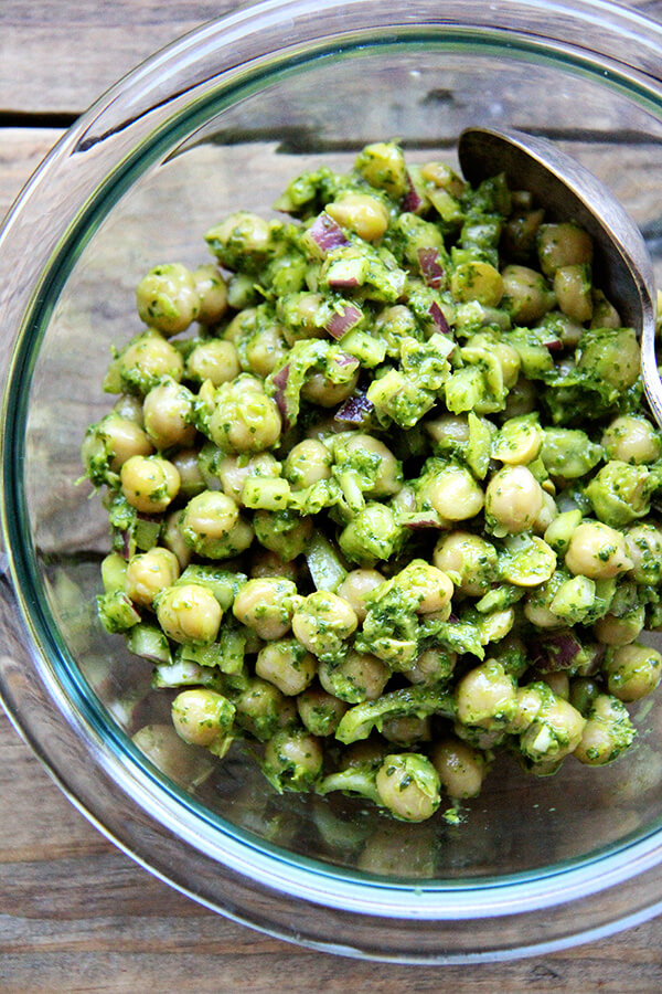 A bowl of chickpeas with cilantro-lime dressing. 