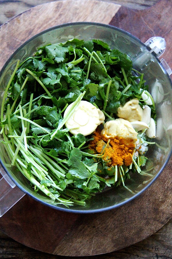 ingredients in for cilantro-lime dressing in a food processor