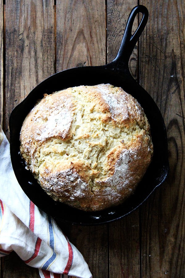 A cast iron skillet with freshly baked Irish soda bread.