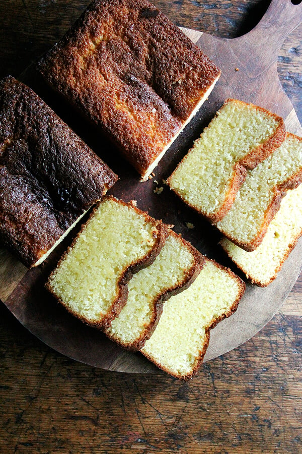 Two loaves of lemon semolina cake, sliced. 