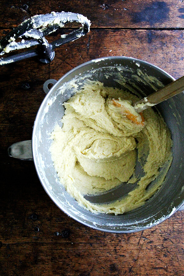 A bowl filled with the batter for the lemon-semolina cake. 