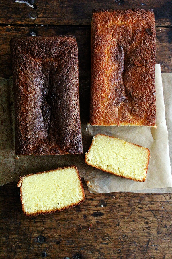 Two loaves of lemon-semolina cake, sliced. 