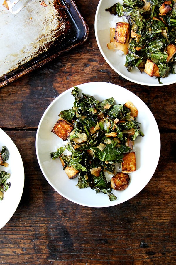 A bowl of baked coconut kale and tofu.