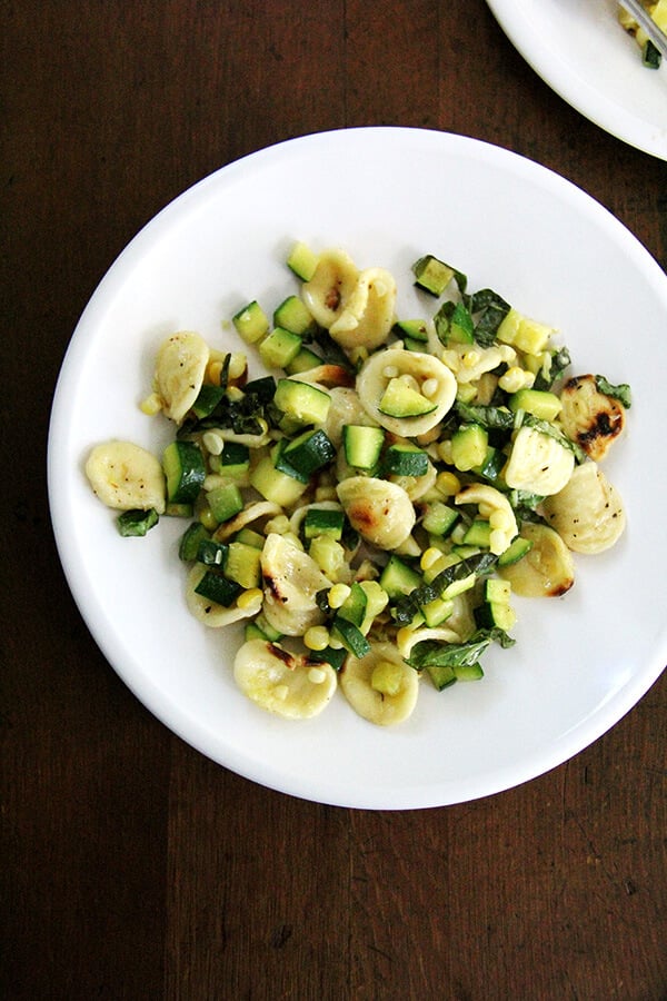 This recipe calls for toasted orecchiette in a hot skillet in a little bit of olive oil. It's a simple step, but one that provides this zucchini and corn pasta with a little more texture, color, and flavor. // alexandracooks.com