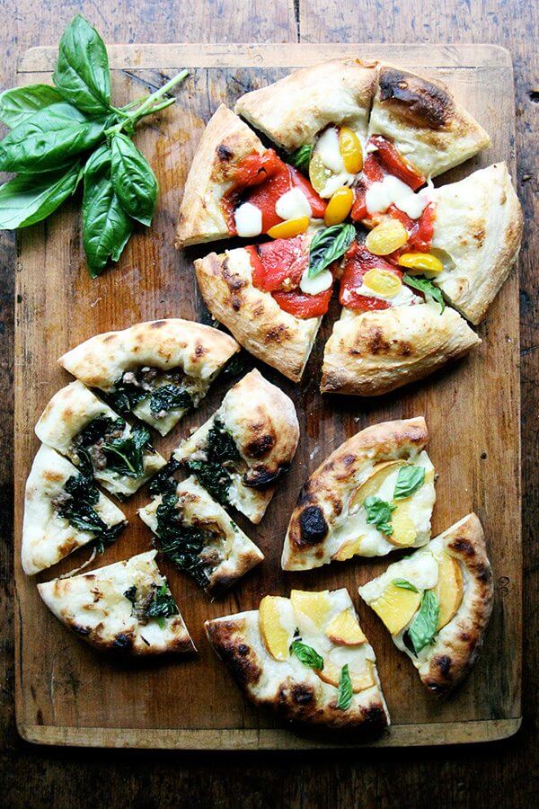 Here are recipes for three summer pizzas — peach and basil, broccoli rabe and sausage, and roasted red pepper and tomato — plus a few pizza-making tips. And even in the summer heat, each colorful crème fraîche-slicked pie makes every second spent in my sultry kitchen well worth it. // alexandracooks.com