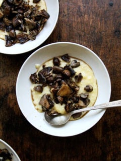I love this recipe for roasted mushrooms. It's a two-step process — the mushrooms roast first covered in foil — then uncovered until their edges brown. I love the technique because during the initial roasting a flavorful broth materializes, giving you two products for one effort. The mushrooms and sauce are especially good spooned over polenta. // alexandracooks.com
