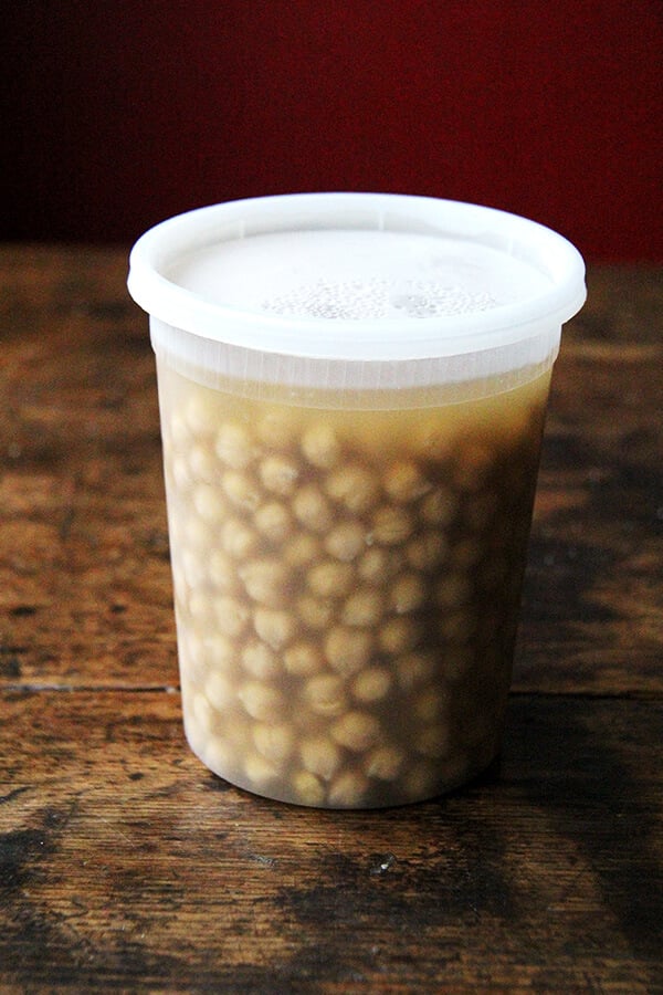 A tub of from-scratch cooked chickpeas.
