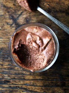 A bowl of homemade vegan chocolate mousse made with whipped aquafaba.