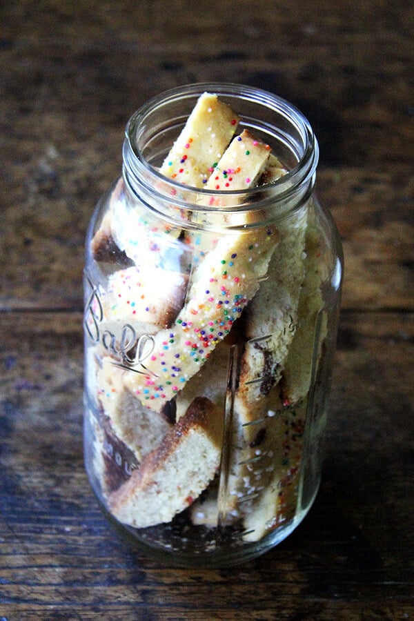 The loaves of this mandel bread with marzipan and sea salt are coated with sprinkles or pearl sugar AND sea salt just before baking, which makes them particularly addictive, and the inclusion of marzipan creates pockets of intense almond flavor and a lovely softness throughout // alexandracooks.com