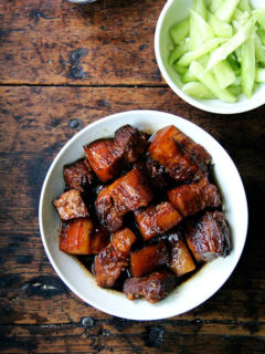 This glazed pork belly with tender cubes of pork in a rich, sweet sauce comes together quite simply. Parboil the meat. 2. Melt sugar in a little bit of water until it begins to caramelize. 3. Glaze the meat in this caramelizing sugar. 4. Add aromatics and some liquids and cook until done. // alexandracooks.com