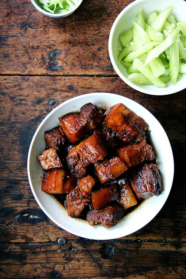 This glazed pork belly with tender cubes of pork in a rich, sweet sauce comes together quite simply. Parboil the meat. 2. Melt sugar in a little bit of water until it begins to caramelize. 3. Glaze the meat in this caramelizing sugar. 4. Add aromatics and some liquids and cook until done. // alexandracooks.com