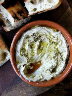 This smoky eggplant dip calls for charring whole eggplant on a grill or over an open flame until the skin is blackened. The rest is easy: pulse the eggplant flesh in a food processor with tahini, Greek yogurt, salt, and fresh lemon, and before serving, drizzle with olive oil and sprinkle with za'atar. Yum. // alexandracooks.com