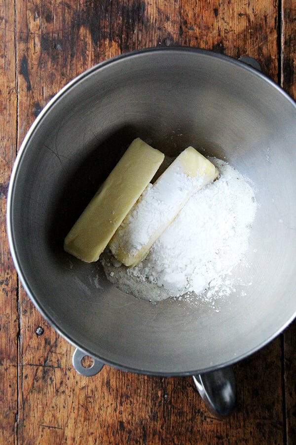 A stand mixer filled with sablé cookie ingredients.