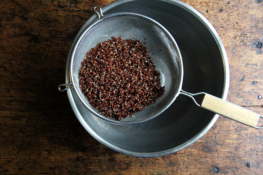 cooked quinoa in a sieve
