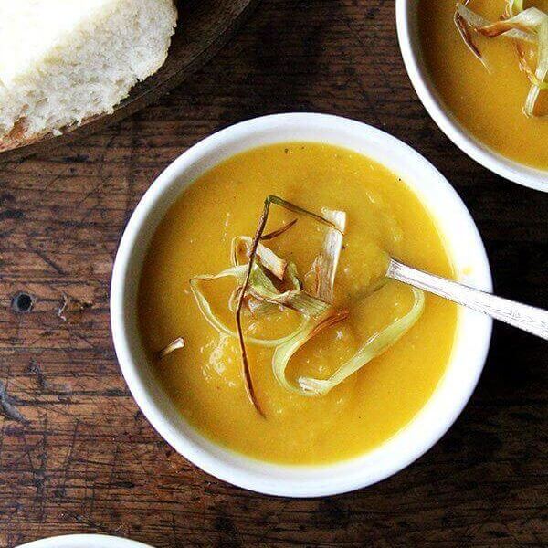 A bowl of Slow cooker butternut squash soup with apple and coconut milk.