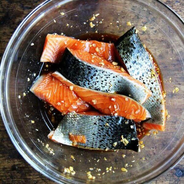 A bowl of ginger-soy marinating salmon.