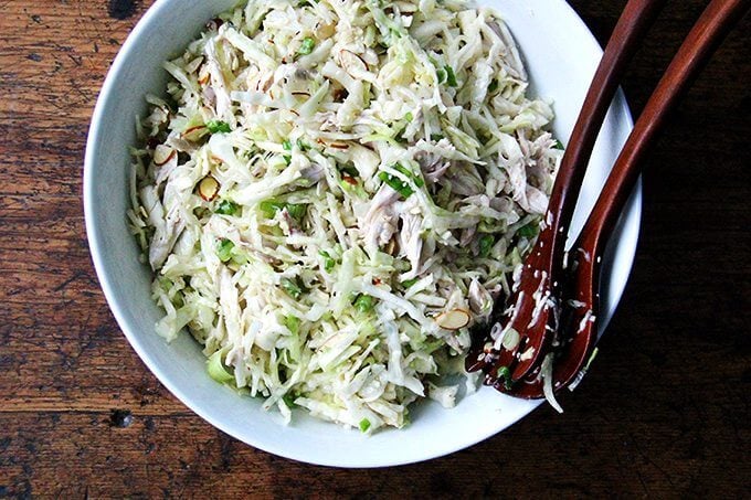 A bowl of chicken and cabbage salad.