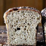 A crumb shot of sprouted wheat sandwich bread.