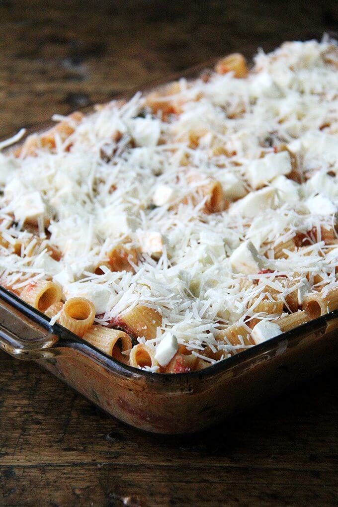 A 9x13-inch pan filled with un-baked baked ziti, ready for the oven.