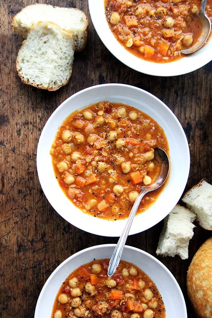 This curried chickpea and lentil soup is a recipe that can be adapted to taste and to what you have in your pantry. I've added chickpeas, omitted the greens, used vinegar in place of the lemon juice, and it always turns out well. Most important, it comes together alarmingly quickly but has a simmered-all-day-kind-of taste. // alexandracooks.com