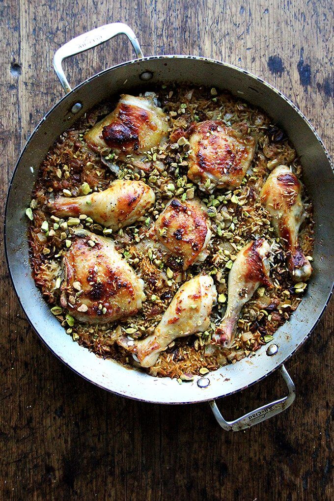 Just-baked one-pot Moroccan chicken and rice with dates, orange, and pistachios.