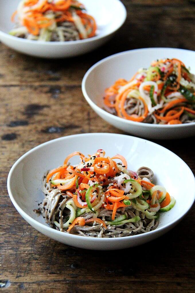 This recipe for almond-sesame soba noodles with quick-pickled vegetables is really fun and super easy. It's also a good one to rely on in the summer — it's so refreshing — and, if you subscribe to a CSA or tend a prolific garden, it makes great use of all of those carrots, cucumbers, and radishes you may find yourself up to your eyeballs in. // alexandracooks.com