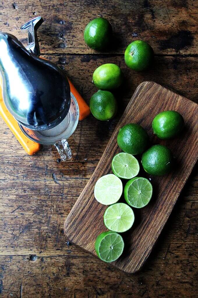 Overhead shot of juicer with limes. 