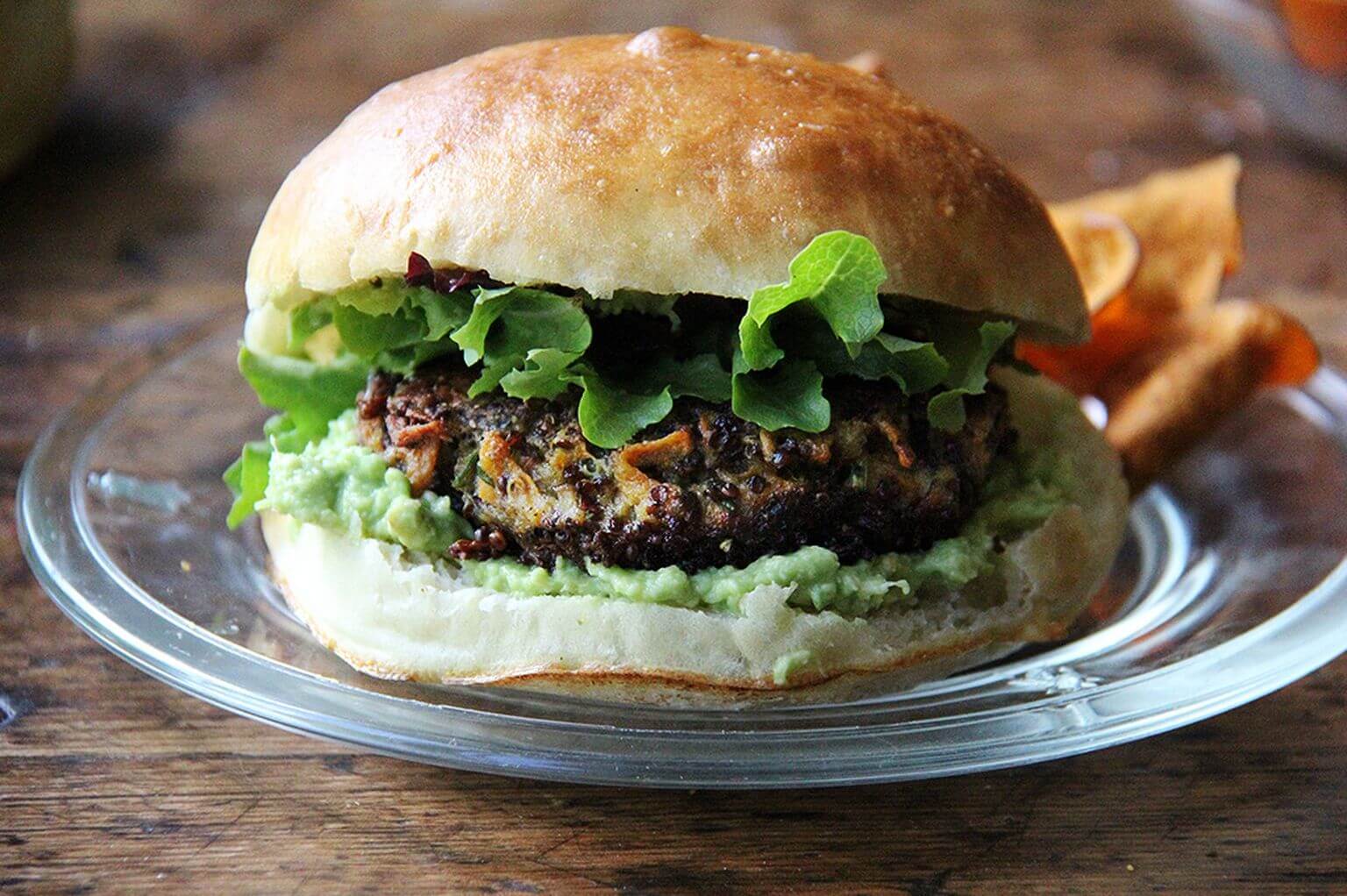 A mushroom-quinoa veggie burger on a plate.