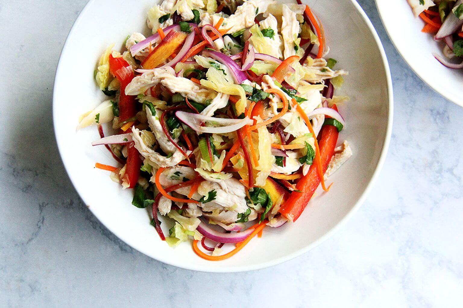 bowl of thai chicken and cabbage slaw
