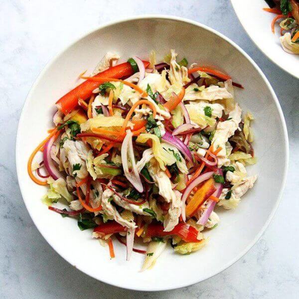 bowl of chicken and cabbage Thai salad.
