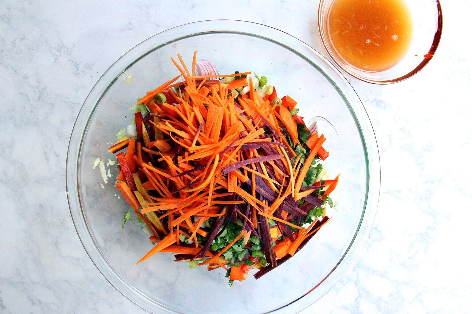 A bowl of julienned carrots.