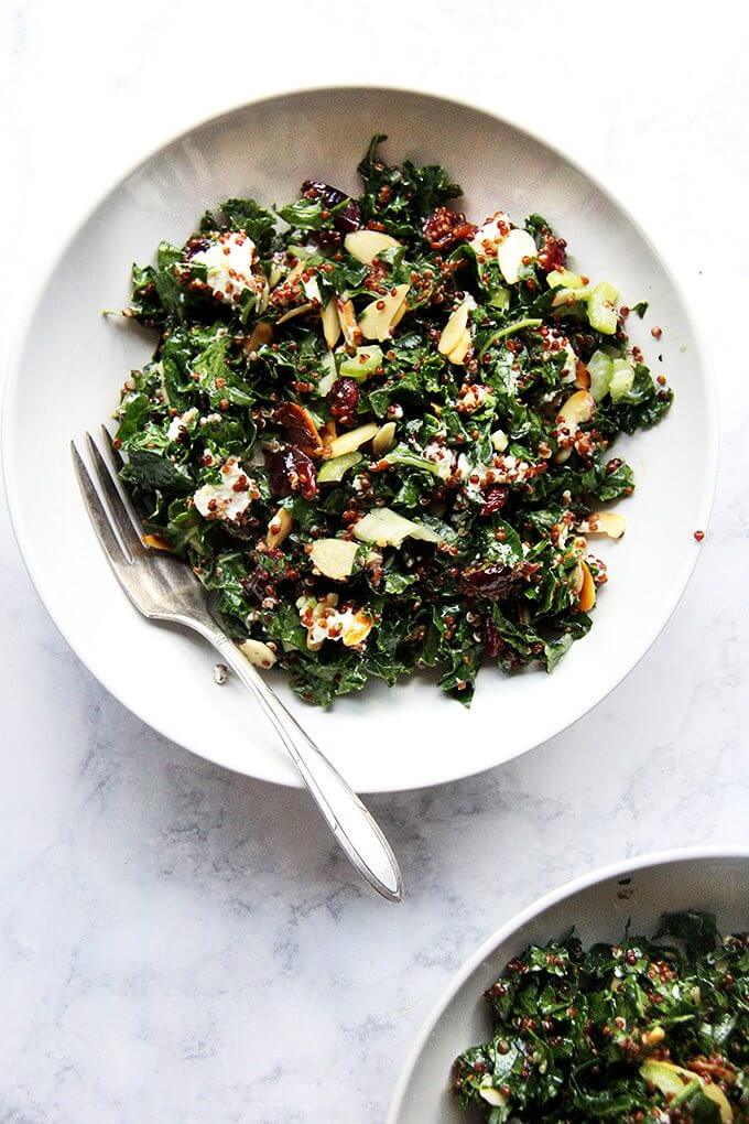 This kale and quinoa salad has a lemony-mustard dressing, dried cranberries that plump with the cooked quinoa, crisp celery, toasted almonds, and goat cheese. It comes together in a snap and has been a welcomed addition to the summer salad rotation. It also keeps well in the fridge for days, making it perfect for lunch-on-the-go or a picnic at the beach. I find it irresistible, and while it's a great side salad, it's nearly a meal in itself. // alexandracooks.com