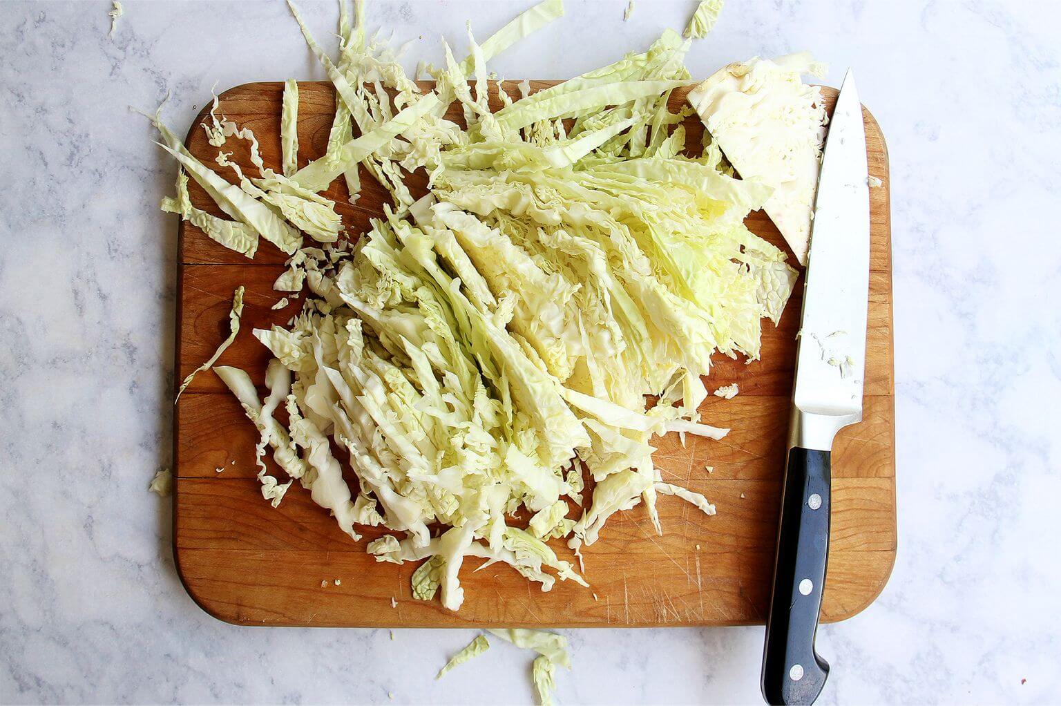 A board of shredded cabbage.