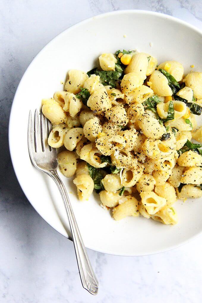 A bowl of creamy corn pasta. 