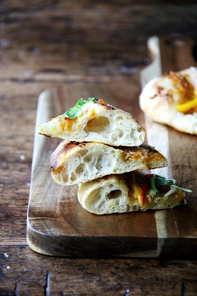 Here I've pickled peppers, onions, and fennel, and I've been tucking the mix into sandwiches, spreading it atop melty cheese toasts, and, as intended, sprinkling it over just-baked pizza. I imagine it would be fabulous with grilled bratwurst or in a Philly cheesesteak-style sandwich. // alexandracooks.com