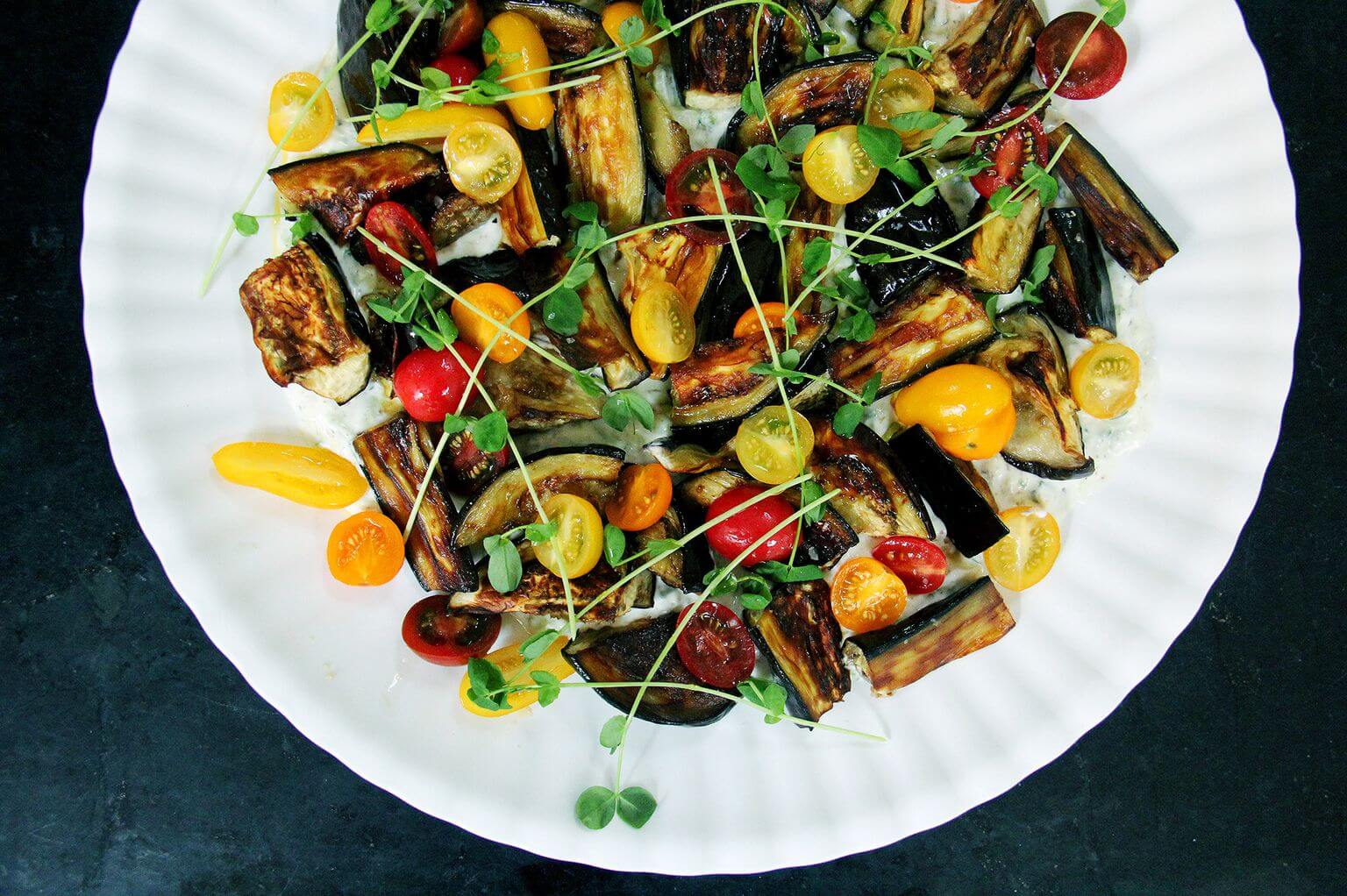 Roasted eggplant, tomato, and tzatziki salad.