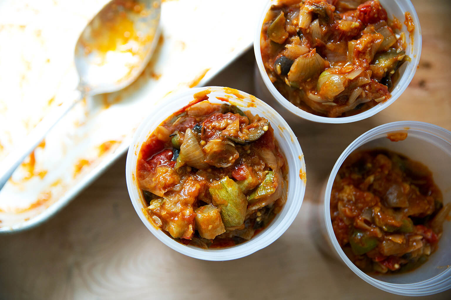 Quart containers filled with ratatouille. 