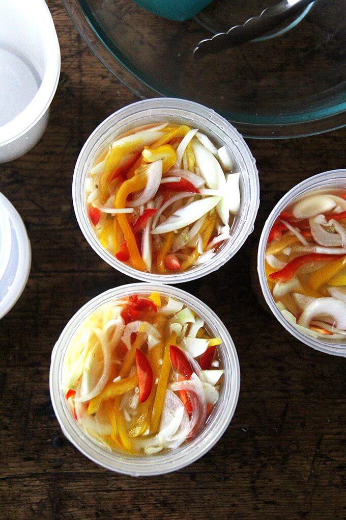 Here I've pickled peppers, onions, and fennel, and I've been tucking the mix into sandwiches, spreading it atop melty cheese toasts, and, as intended, sprinkling it over just-baked pizza. I imagine it would be fabulous with grilled bratwurst or in a Philly cheesesteak-style sandwich. // alexandracooks.com