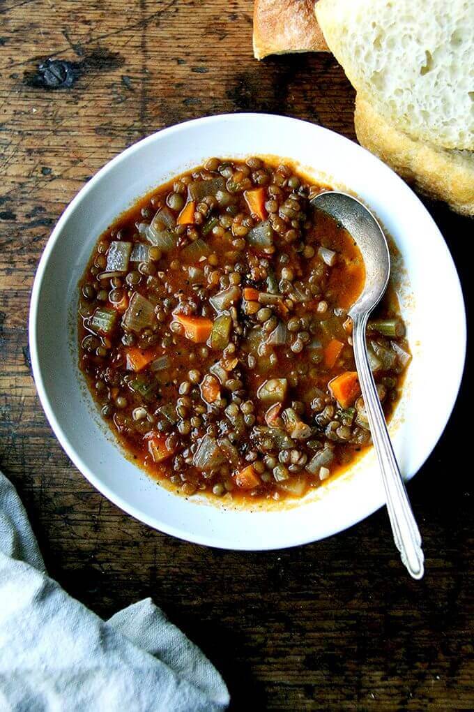 A bowl of one-pot vegan lentil soup.