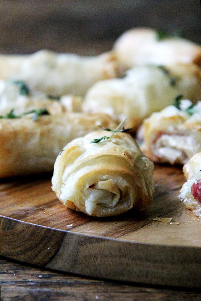 An up close shot of a salami and provolone phyllo roll.