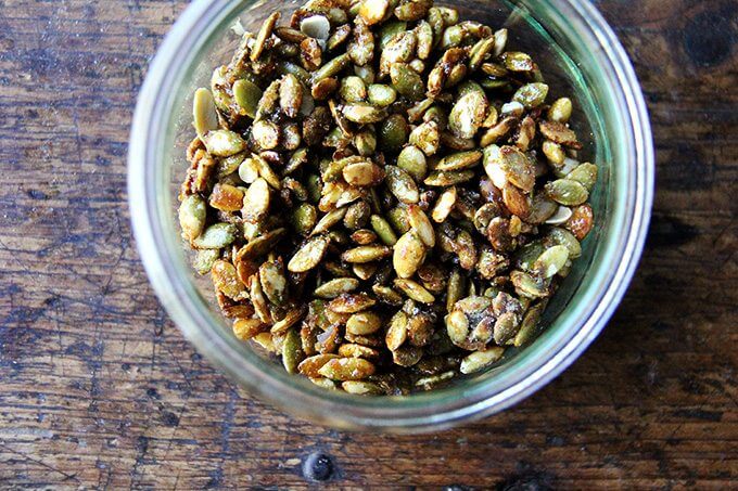 A jar of candied pumpkin seeds.