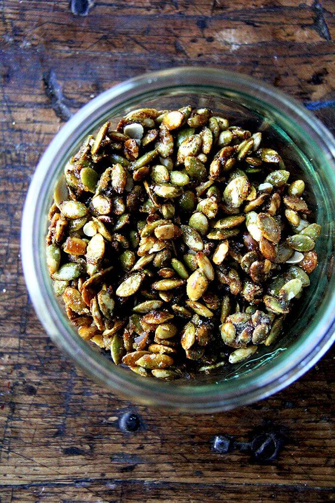 A jar of candied pumpkin seeds.