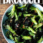 Roasted Broccoli in a bowl with garlic, lemon, and parmesan.