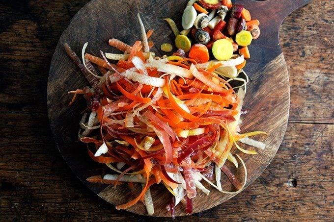 Carrot peels on a board.