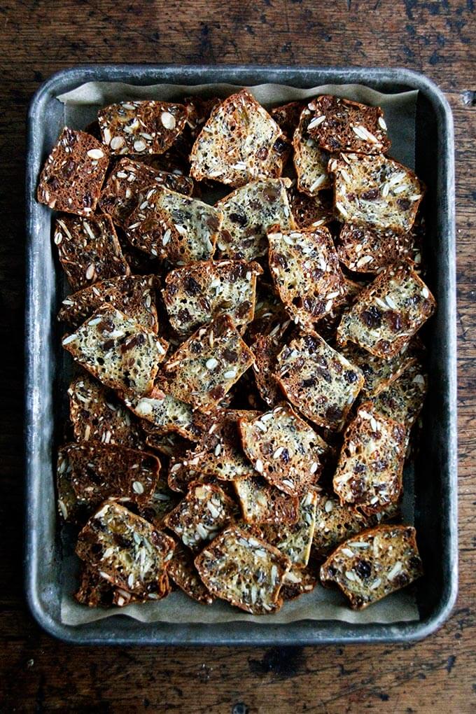 Sliced three seed crackers, just baked on a sheet pan. 