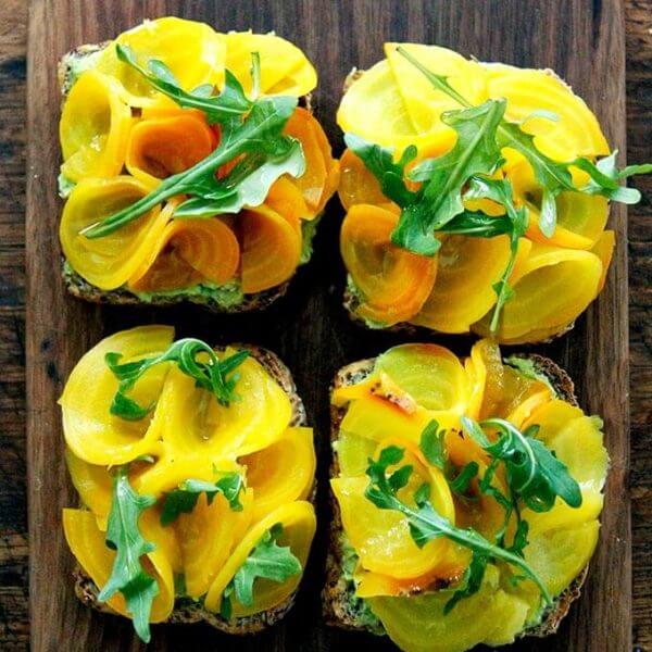 A board with beet-avocado tartines.