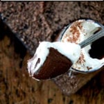 A spoonful of chocolate pots de creme.