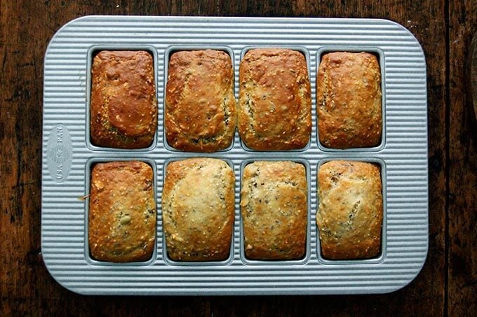 Just baked loaves of three-seed crackers.