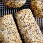Quinoa-flax toasting bread on a cooling rack.