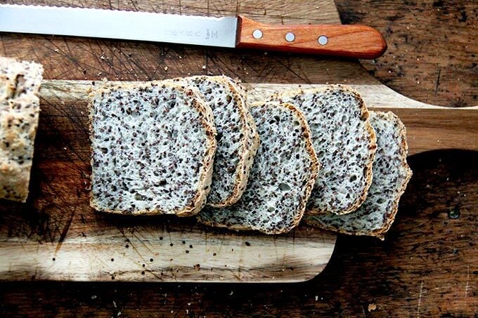 Sliced loaf of quinoa-flax bread. 